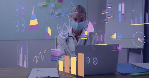 Doctor Analyzing Digital Medical Data on Laptop in Office