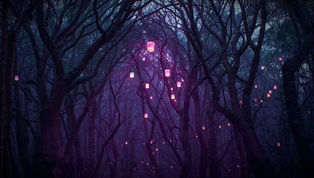 Ethereal light: mystical lanterns amidst enchanted forest