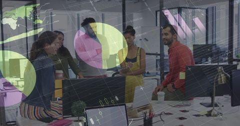 Team collaboration with financial data visualization in office