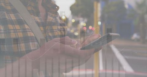 Caucasian Man Using Smartphone with Financial Data on the Go - Download Free Stock Images Pikwizard.com