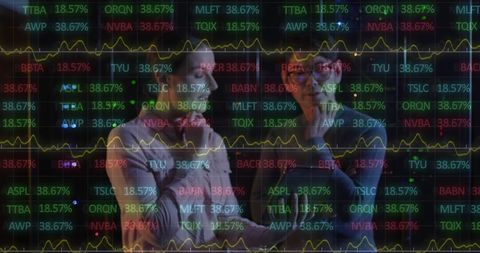 IT Engineers Analyzing Stock Data in Server Room