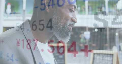 Businessman Analyzing Data with Technology