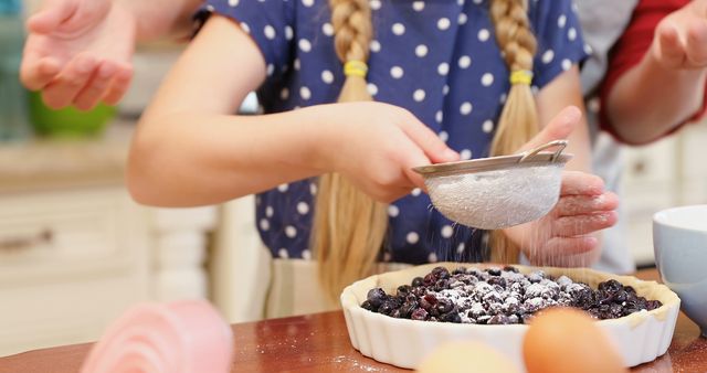 Child Baking Homemade Blueberry Pie with Family in Kitchen - Download Free Stock Images Pikwizard.com