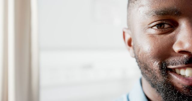 Close-up of Smiling Man with Beard in Natural Light - Download Free Stock Images Pikwizard.com