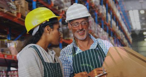 Logistics Professionals Collaborating in Warehouse Environment - Download Free Stock Images Pikwizard.com