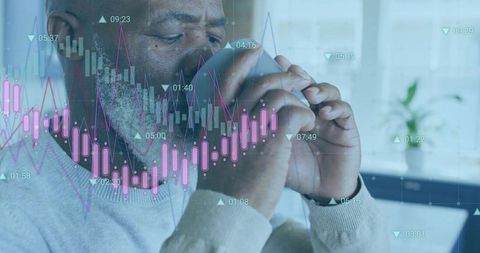 Investor studying mobile trading charts on smartphone with smartwatch in bright office