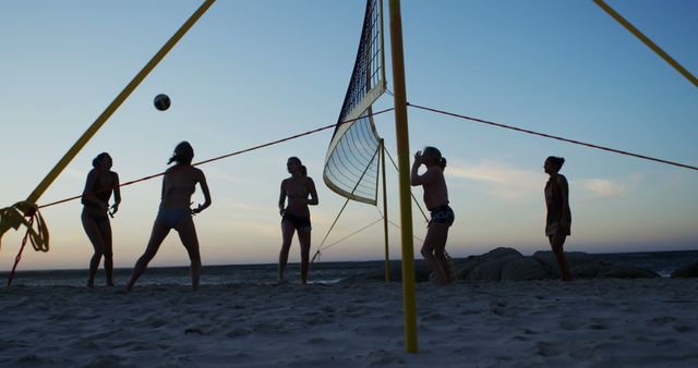 People Playing Beach Volleyball at Sunset - Download Free Stock Images Pikwizard.com