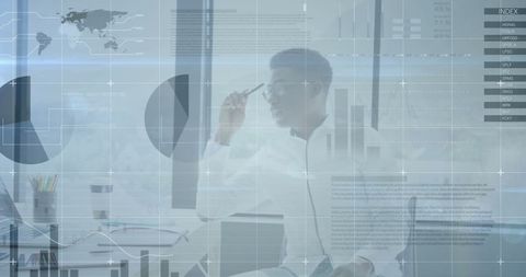 visionary businessman analyzing financial data in modern office - Download Free Stock Images Pikwizard.com