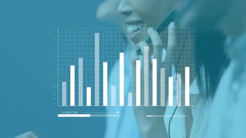 Call Center Team Analyzing Live Chart Data on Screens