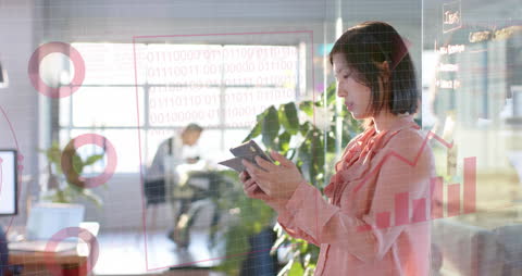 Businesswoman Using Digital Tablet with Data Visualization Graphics