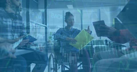 Diverse Team Analyzing Financial Data on Digital Devices