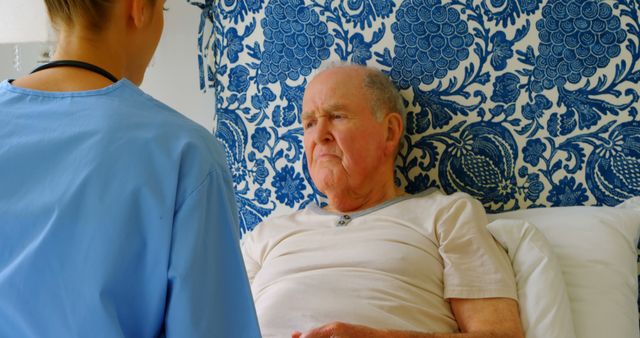 Nurse Caring for Elderly Patient in Home Care Environment - Download Free Stock Images Pikwizard.com