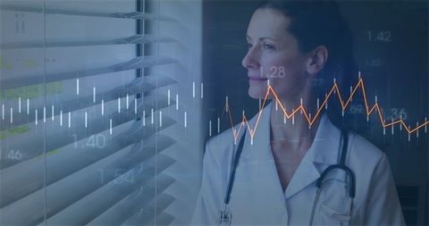 Caucasian Female Doctor Analyzing Data Trends