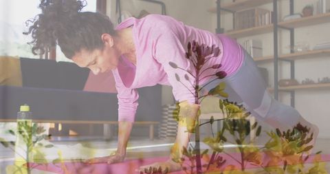 Woman Practicing Yoga Pose Amidst Blossoming Plants Overlay
