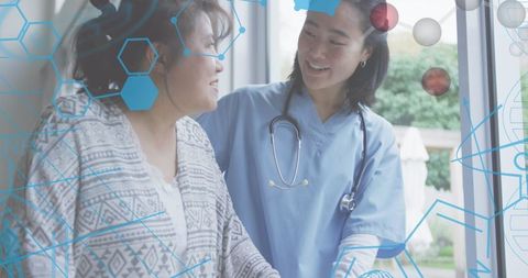 Senior patient consultation with smiling asian female doctor
