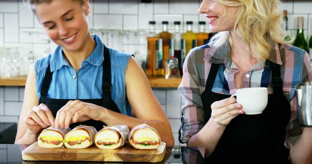 Female Baristas Preparing Sandwiches and Making Coffee in Cafe - Download Free Stock Images Pikwizard.com