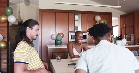 Diverse Friends Gather for a Relaxed Home Gathering