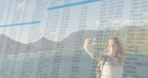 Young woman taking selfie on scenic ferry voyage