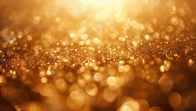Shimmering gold glitter bokeh background creating warm luxury sparkle and macro glittering