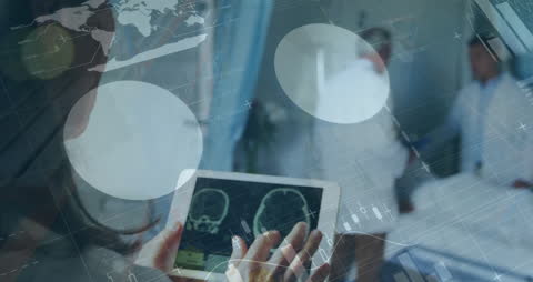 Digital Healthcare Team Analyzing Medical Data on Tablet