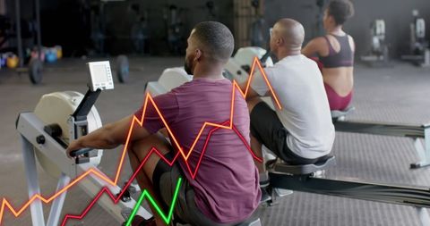 group training on rowing machines with digital data overlay - Download Free Stock Images Pikwizard.com