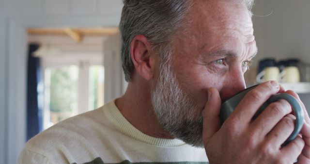 Senior Man Drinking Coffee at Home in Morning Light - Download Free Stock Images Pikwizard.com