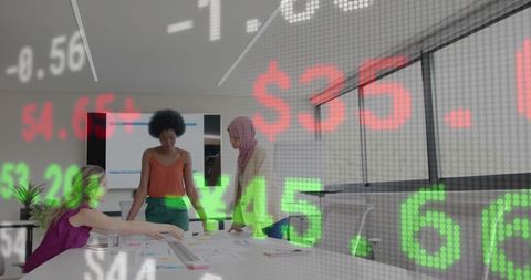 Diverse team analyzing financial data with projected stock figures