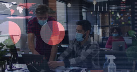 Business Colleagues Analyzing Digital Financial Data in Office Environment