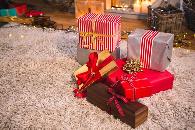 Wrapped Christmas gifts with colorful ribbons and bows placed on a fur carpet in a cozy living room. Ideal for holiday-themed promotions, festive greeting cards, home decor inspiration, and family celebration visuals.