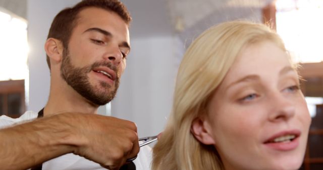 Skilled Barber Trimming Client's Hair in Stylish Salon - Download Free Stock Images Pikwizard.com