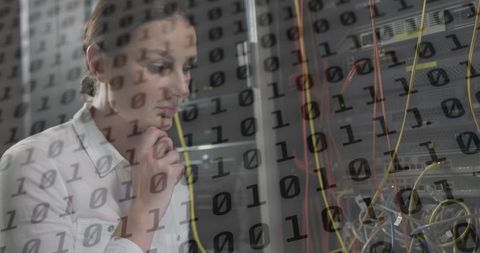 Data processing on female tech worker in server room