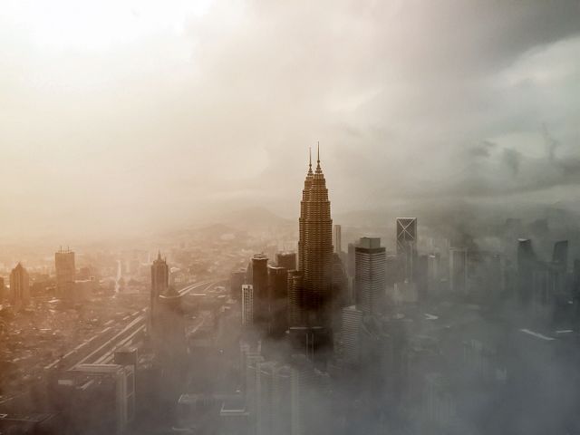 Foggy Skyline of Kuala Lumpur at Sunrise - Download Free Stock Photos Pikwizard.com