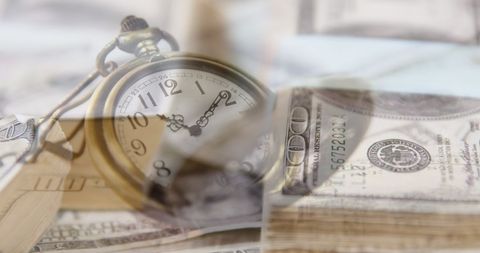 Concept of time and money illustrated by pocket watch and dollar bills