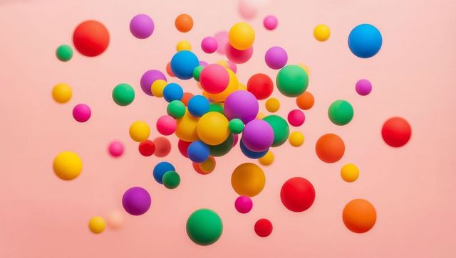 Floating multicolor spheres forming vibrant central cluster pastel pink backdrop