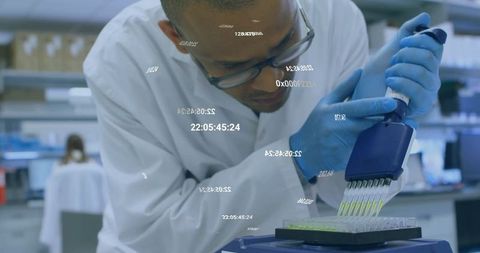 Scientist using multi-channel pipette in laboratory research setting