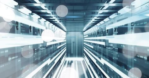 Glowing server cabinets in data center with light streaks