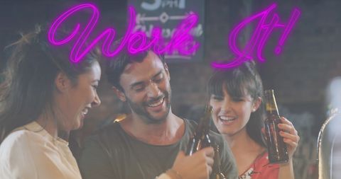 Diverse Friends Celebrating with Beers Under Neon Text