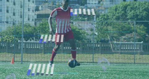 Soccer player dribbling on urban turf with digital performance overlays