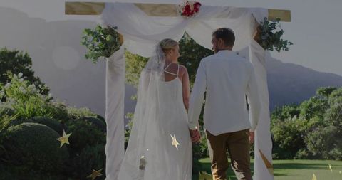 Romantic Outdoor Wedding Under Elegant Archway
