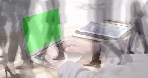 Laptop with Green Screen amid Busy Pedestrian Blur in Office - Download Free Stock Images Pikwizard.com