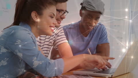 Diverse Group Collaborating on Innovative Digital Project