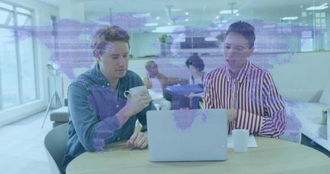 Open-plan office teamwork in modern corporate environment