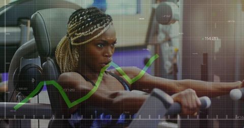 Fit woman pushing gym machine handles wearing sports bra with rising data trend overlay