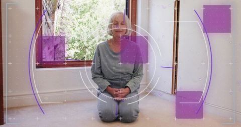 Senior woman kneeling in mindful meditation with purple augmented reality hud and garden light