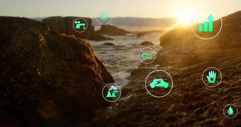 Eco Icons Overlay on Scenic Seascape at Sunset