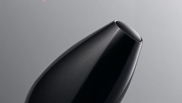 Teardrop smart speaker sleek silhouette with perforated mesh streaming modern audio