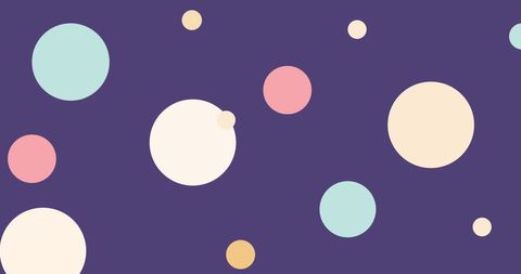 Playful abstract pattern with colorful circles on dark background