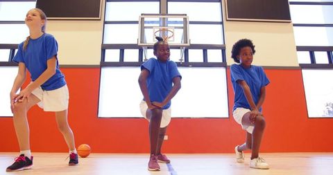 Diverse Girls Training on Basketball Court, Unity in Sports
