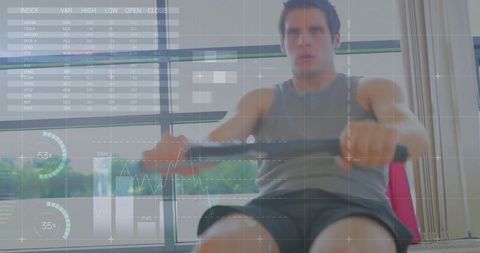 Male athlete rowing on ergometer gripping handle, training with HUD fitness overlay
