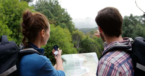 Couple Navigating Forest Trails Using a Map - Download Free Stock Images Pikwizard.com